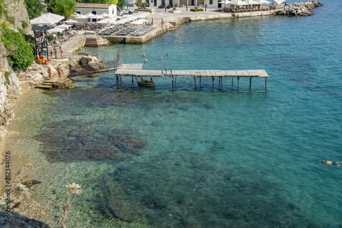 beautiful view over the beach in corfu, greece with really clear water