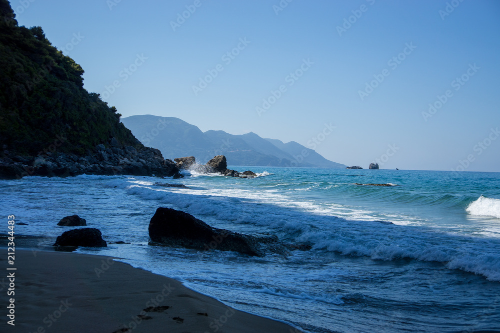 beautiful coastline in corfu, greece with steep cliff
