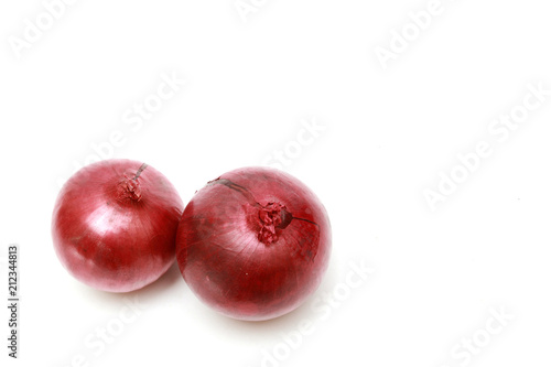 Two red onion isolated on white background