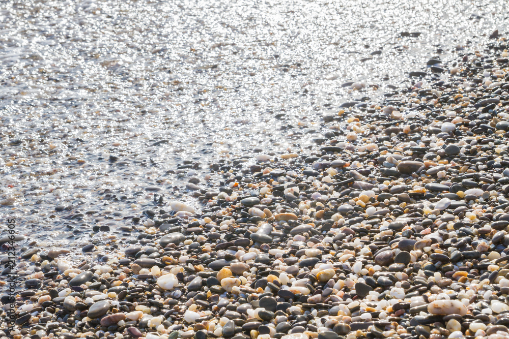 Sea stones on the seashore in the summer Sea stones on the seashore in the summer