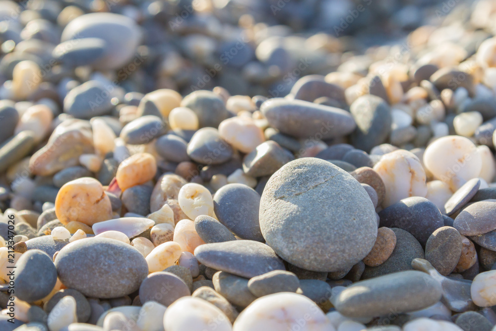 Sea stones on the seashore in the summer Sea stones on the seashore in the summer