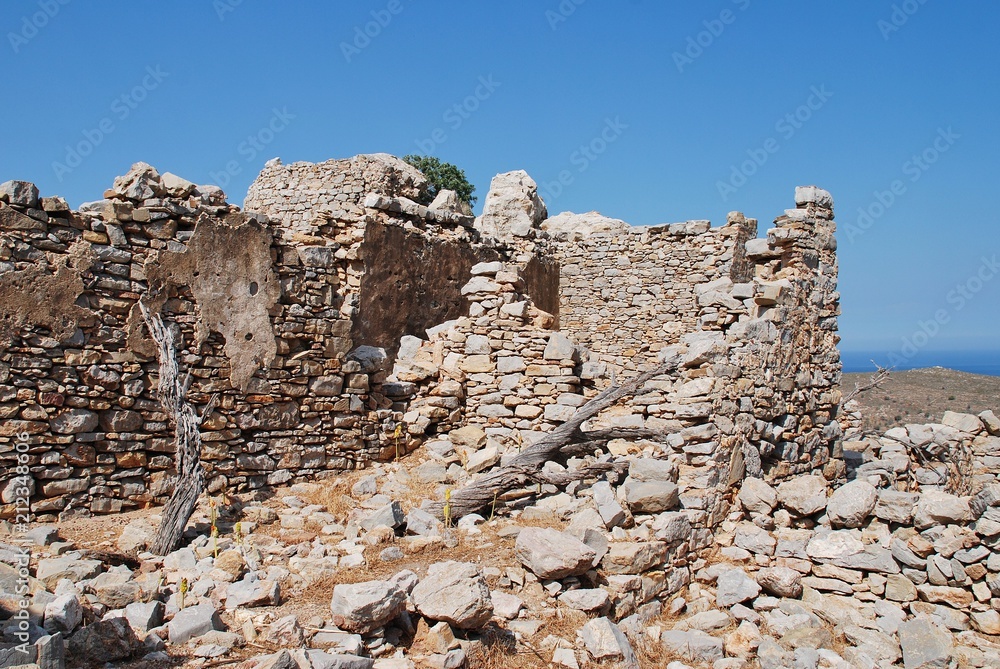 The remains of the medieval Crusader Knights castle above Mikro Chorio on the Greek island of Tilos. The remains of the medieval Crusader Knights castle above Mikro Chorio on the Greek island of Tilos.