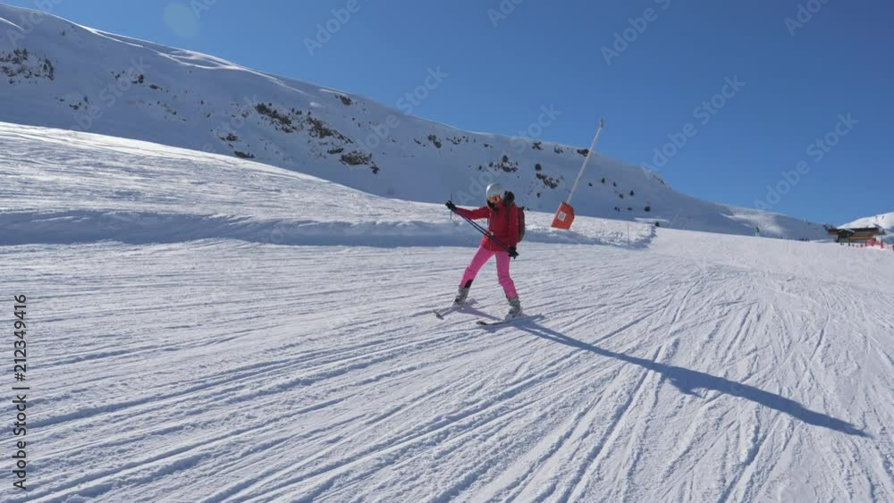 Beginner Skier Skiing Down The Mountain Slope And Learns To Turn Skis Beginner Skier Skiing Down The Mountain Slope And Learns To Turn Skis