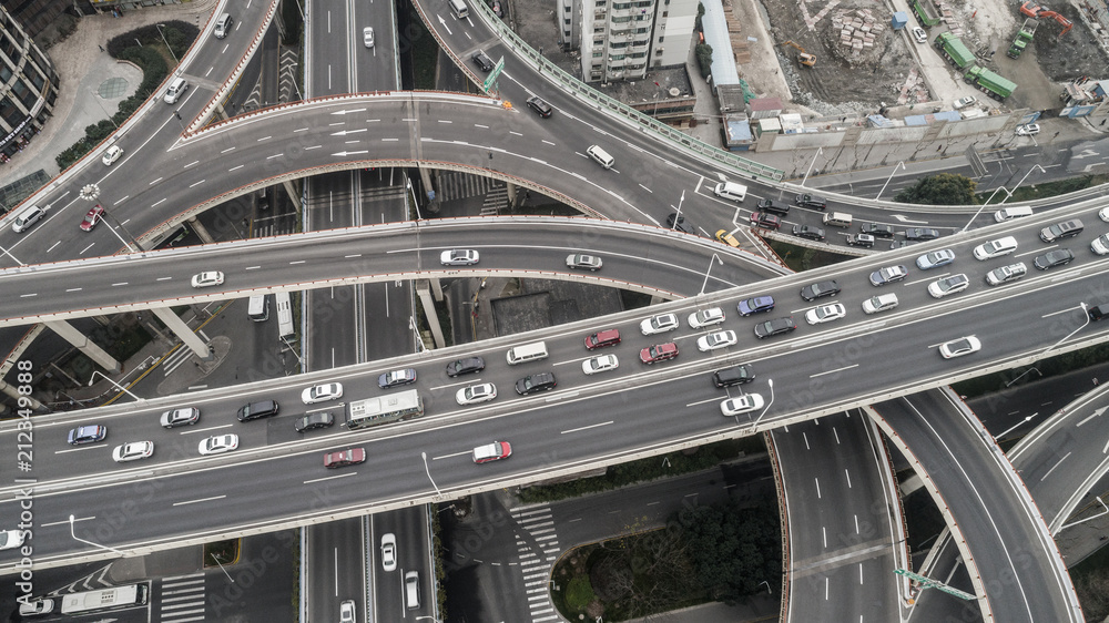 Aerial view of highway and overpass in city on a cloudy day Aerial view of highway and overpass in city on a cloudy day