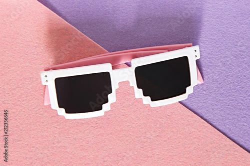 White Pixel glasses on a pink and purple background