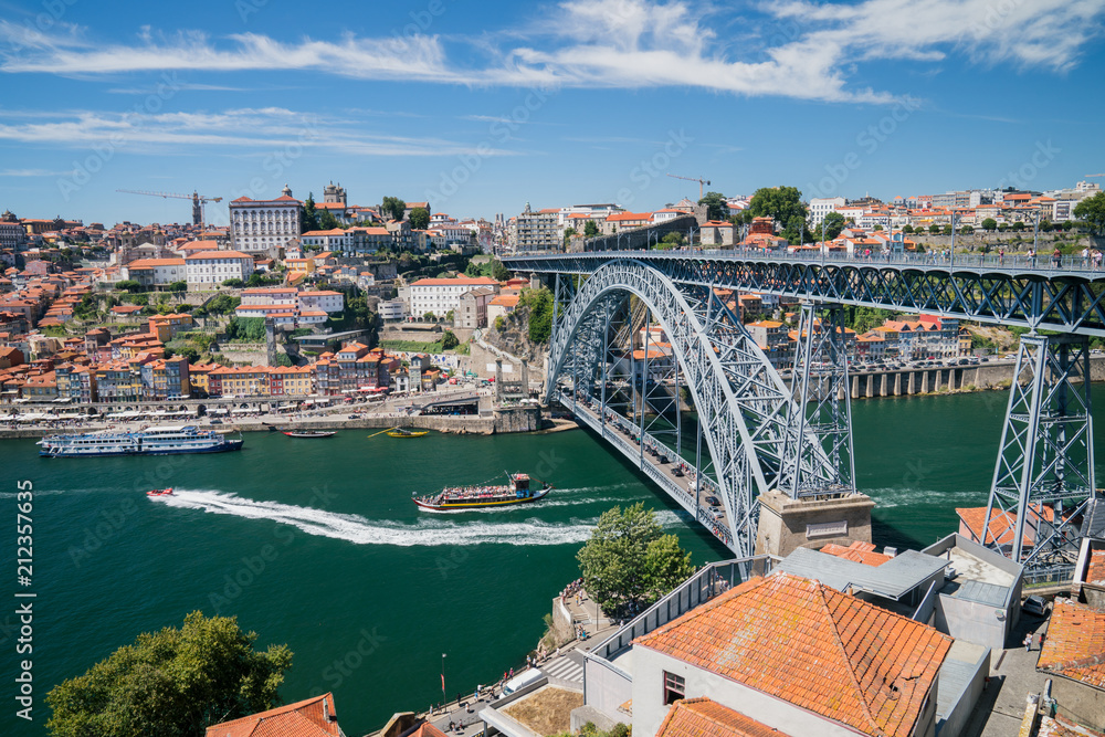Panoramic view of Dom Luis Bridge in Porto (Portugal) in a summer day. 