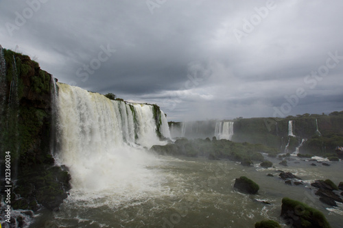 The Igua  u Falls is a group of about 275 waterfalls on the Igua  u River in Brazil and Argentina.