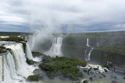 The Igua  u Falls is a group of about 275 waterfalls on the Igua  u River in Brazil and Argentina.