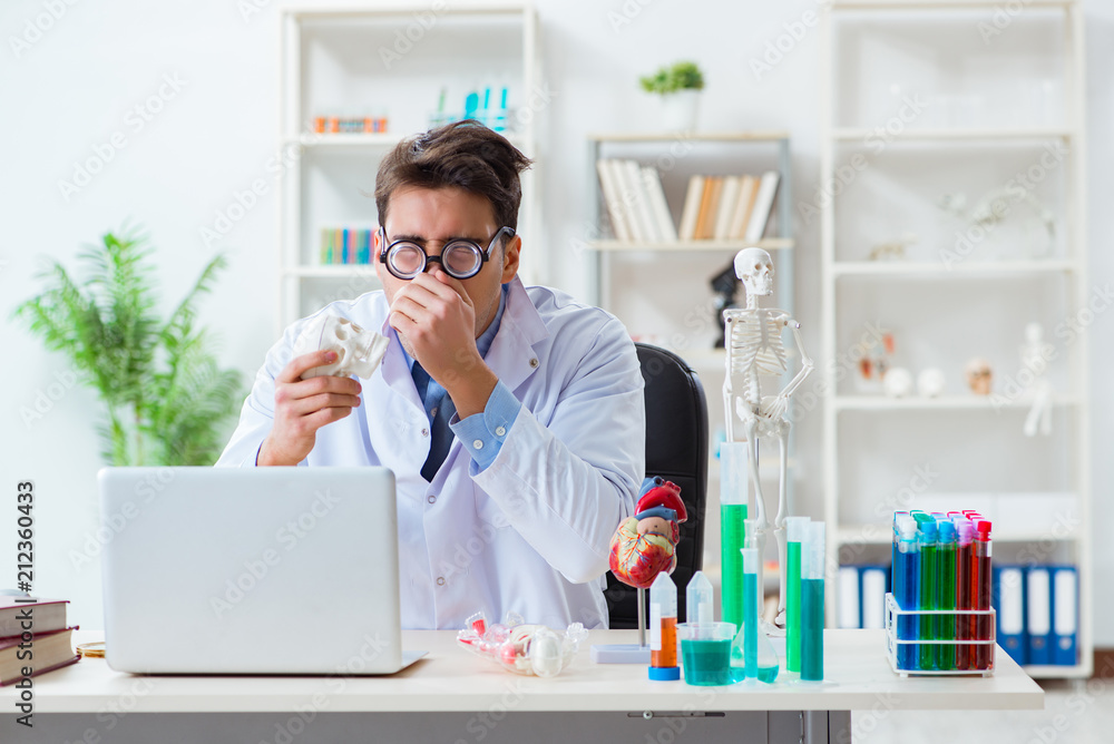 Funny doctor having fun in hospital lab Funny doctor having fun in hospital lab