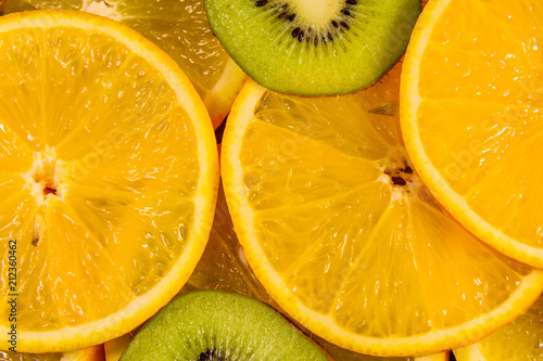 Background of the kiwi and orange fruits