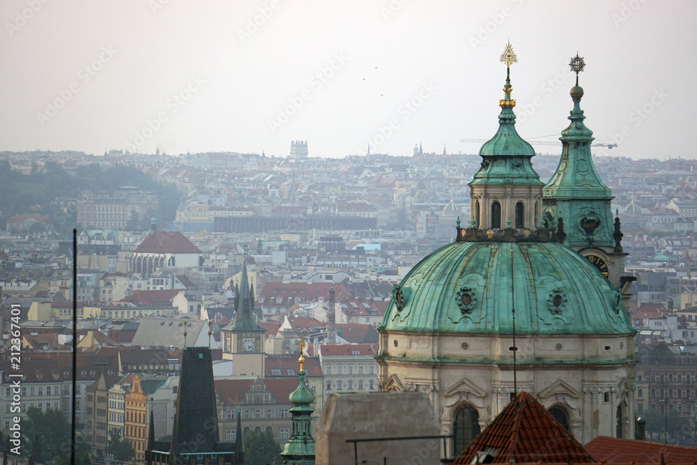 Panorama of Prague at dawn in front of the church of Saint Nicholas, Prague, Czech Republic