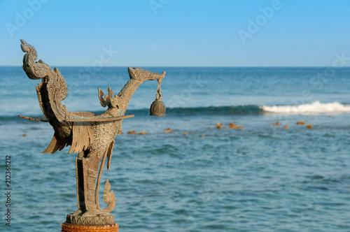 Dragon sculpture on the shore