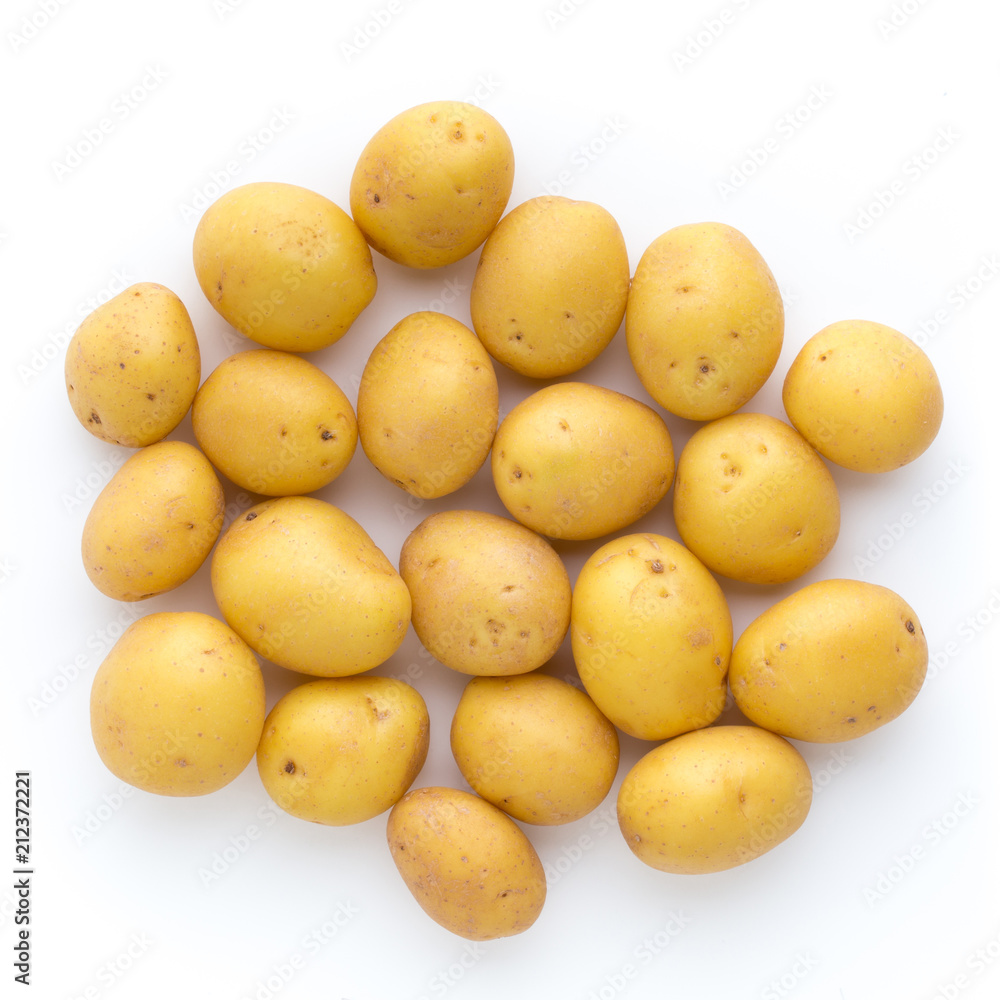 Young potato isolated on white background. Harvest new. Flat lay, top view Young potato isolated on white background. Harvest new. Flat lay, top view