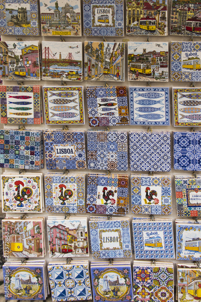 Traditionally decorated ceramic tiles for sale as souvenirs in front of a street shop in Lisbon Traditionally decorated ceramic tiles for sale as souvenirs in front of a street shop in Lisbon