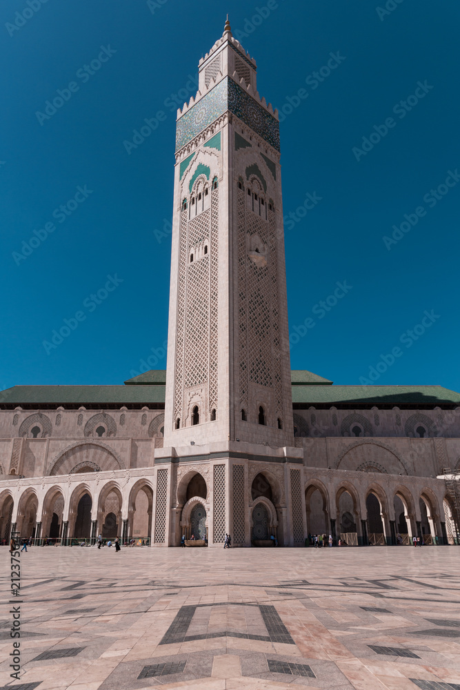 Symmetrical shot of Hassan II mosque against sky