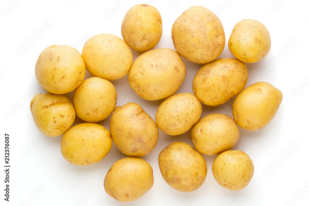 New potato and rosemarin isolated on white background close up.