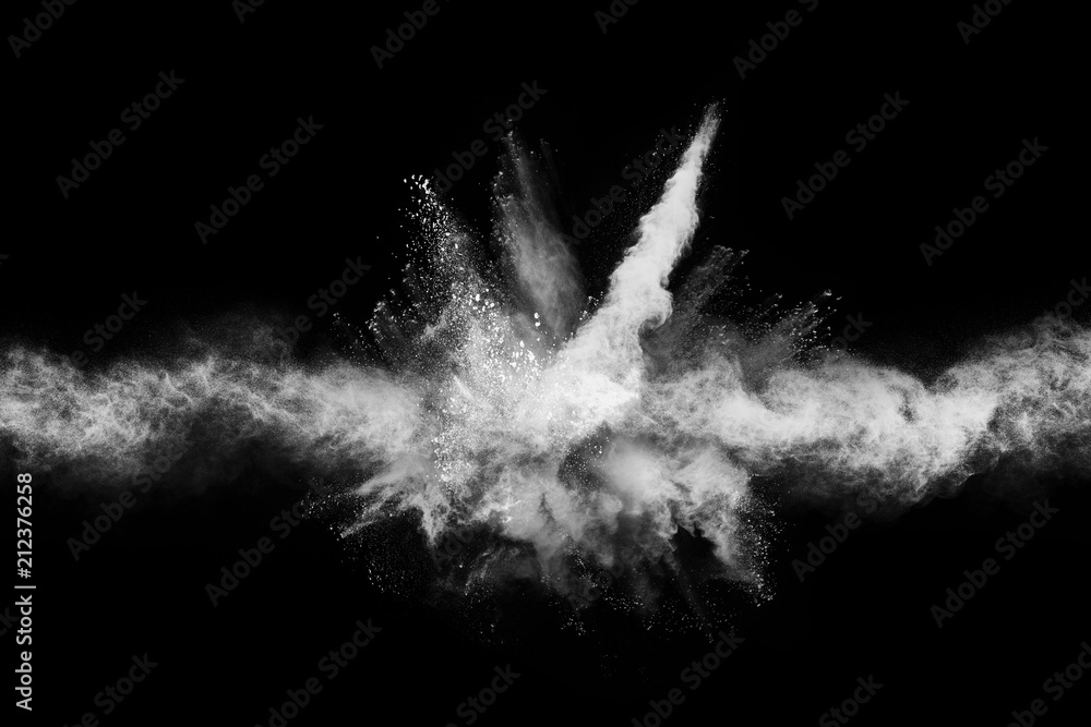 Launched white powder, isolated on black background. Stock Photo ...