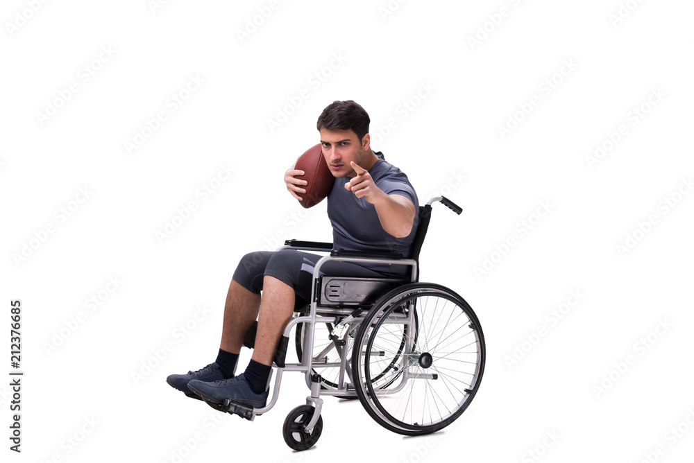 Football player recovering from injury on wheelchair Football player recovering from injury on wheelchair