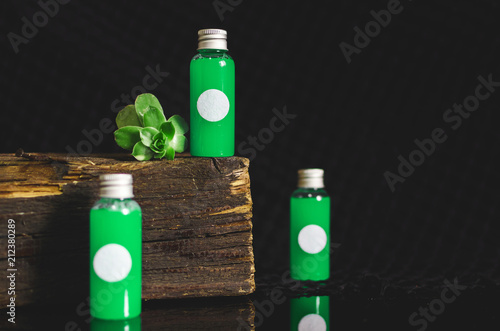 small medicine three green bottles with white cyrcle photo