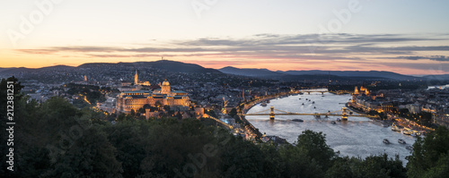 panoramic view of the city with the castle and the chain bridge on the river Danube at dusk
