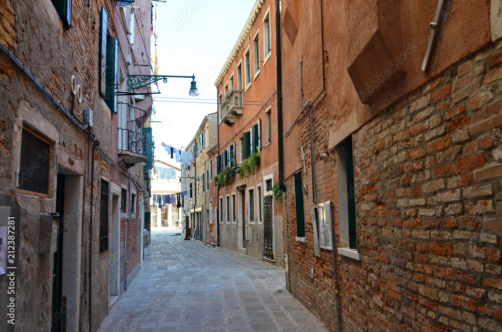 An empty alley way (lane) between buildings in Venice