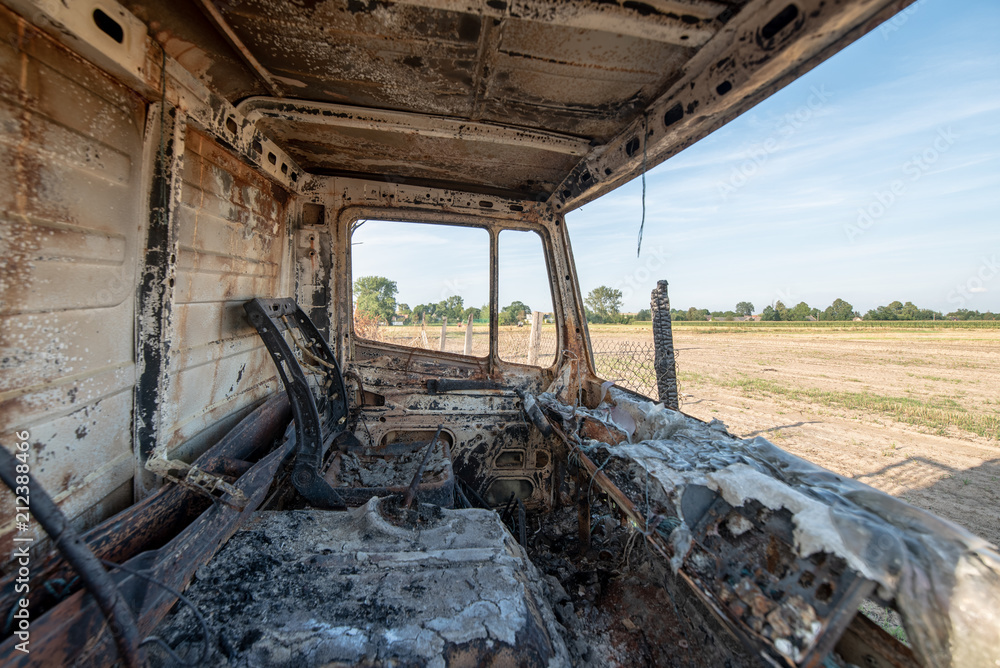 Fototapeta premium Old burned destroyed car