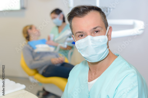 dentist in the clinic posing