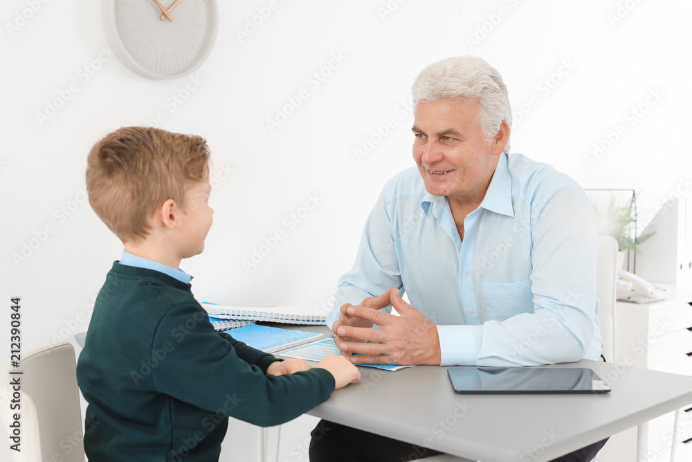 Little boy having appointment at child psychologist office