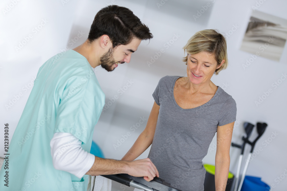 womanduring physical rehabilitation womanduring physical rehabilitation