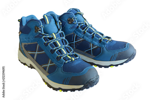 Warm winter trekking shoes for men. Sports shoes for tracking. Isolated, white background.