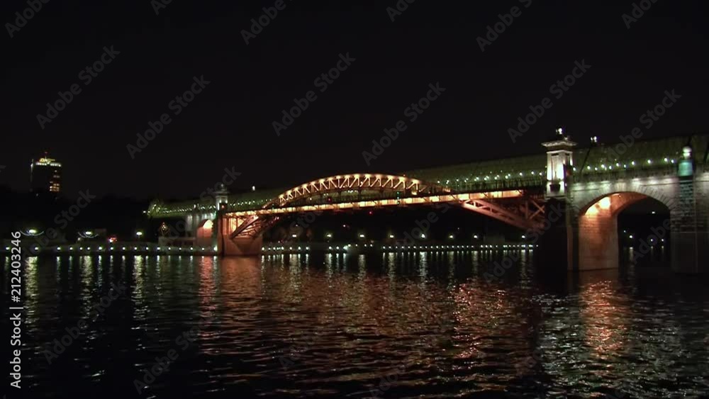 Pushkinsky Andreyevsky Bridge over river in evening Moscow. Beautiful views of capital at sunset. Arched steel construction in big city. Pushkinsky Andreyevsky Bridge over river in evening Moscow. Beautiful views of capital at sunset. Arched steel construction in big city.