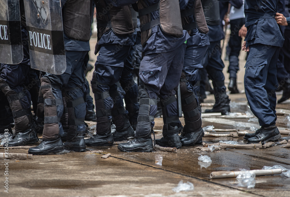 Riot police clashed with the protesters. Riot police clashed with the protesters.