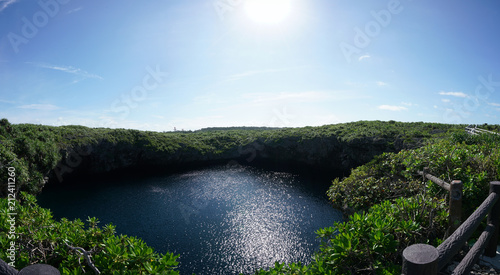 Okinawa,Japan-July 7, 2018: Tori ike is a blue hole at Shimoji island. It consists of two lakes. The color changes due to thermocline.  photo