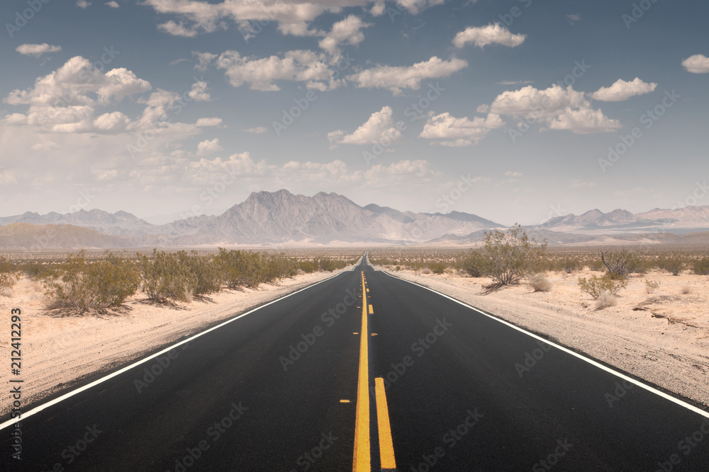 Naklejka premium panoramic view of hot summer road through the Nevada desert