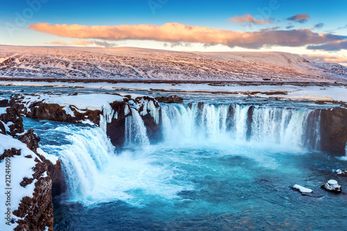 Godafoss waterfall at sunset in winter, Iceland.