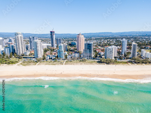 An aerial view for the Broadbeach skyline on the Gold Coast in Queensland with blue water
