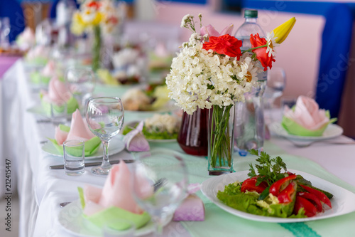 A bouquet of flowers on a festive table