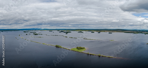 Kemijärvi Finland, Patojärvi lake north of Kemijärvi city with fells in the horizon photo