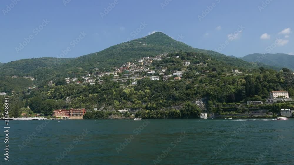 Houses and villas on Lake Como seen from the ferry, Italy Houses and villas on Lake Como seen from the ferry, Italy