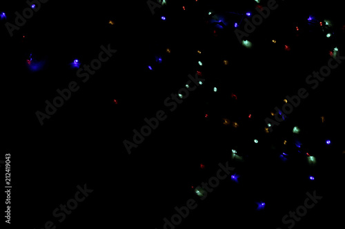 Pattern Of Blurred Neon Lights Over Black Background.Intentional Blur Of The Lights. Abstract Colorful Background. 