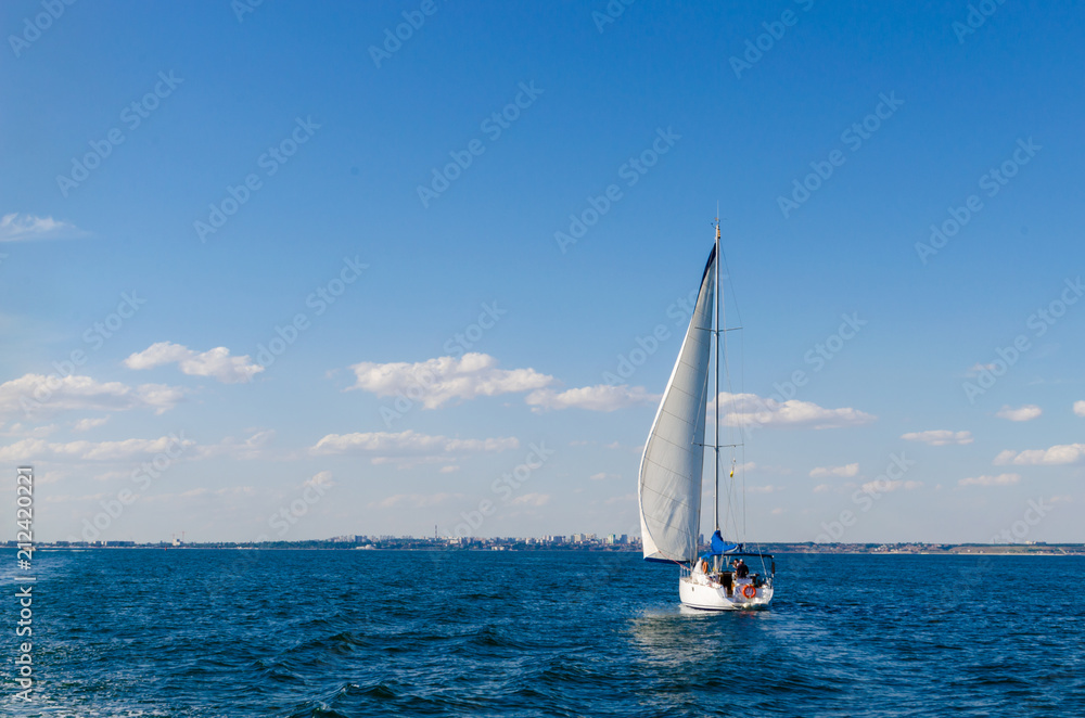 Seascape with white yacht on the sea in Odesa