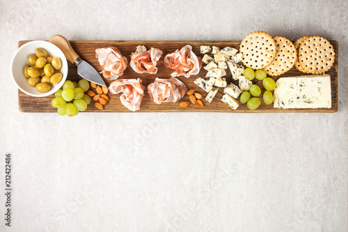 Photography Cheese, bacon, olives and crackers