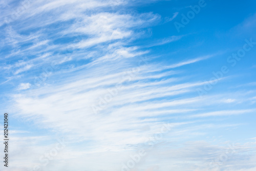 High cirrus clouds with blue sky background.