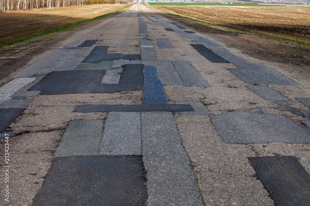 Fototapeta premium Patch repair of asphalt.