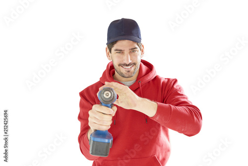 Smiling handyman with power drill