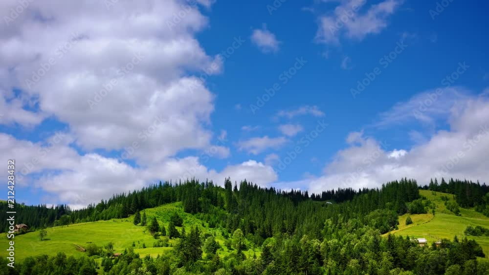Summer mountain rural landscape with clouds over blue sky. 4K 3840X2160 UltraHD time lapse footage. Summer mountain rural landscape with clouds over blue sky. 4K 3840X2160 UltraHD time lapse footage.