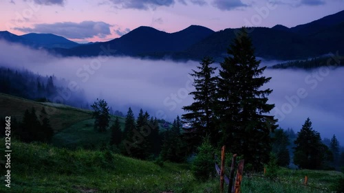 Time lapse 4K video of clouds and fog moving at mountain valley
