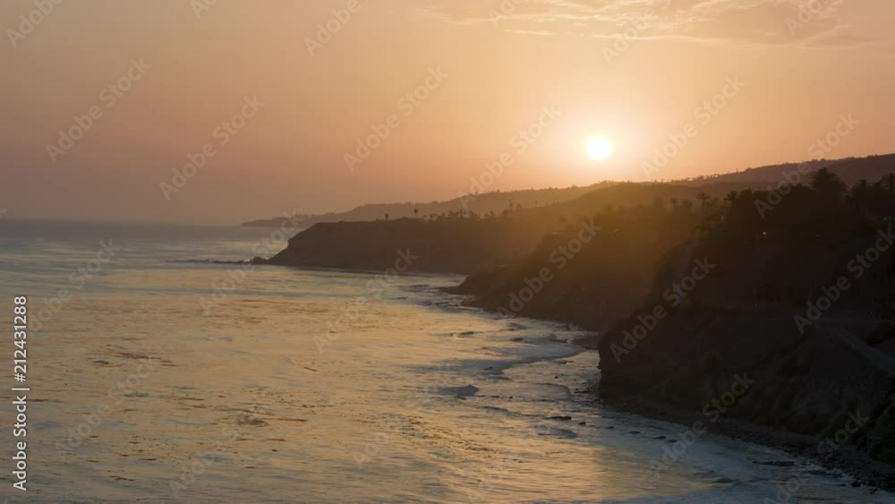 Sun over the hills at San Pedro beach, California. Sun over the hills at San Pedro beach, California.