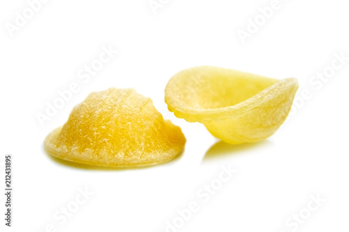 Two Dry Uncooked Orecchiette Italian Pasta . Isolated on White Background