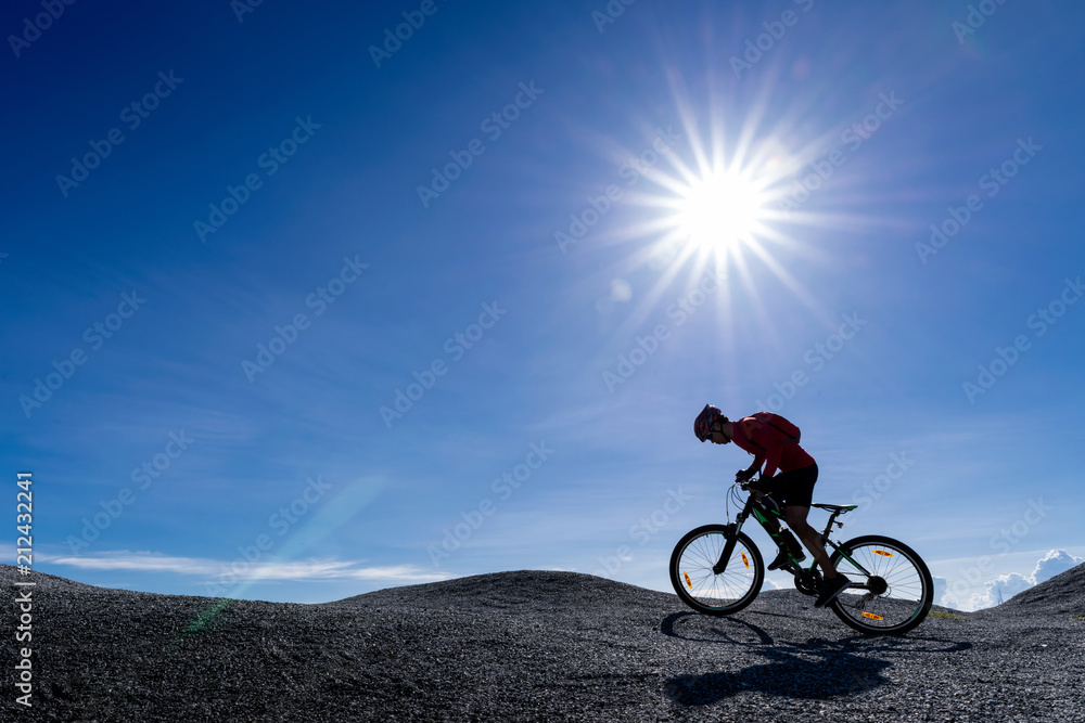 Obraz premium Extreme mountain bike sport athlete man riding outdoors lifestyle trail.